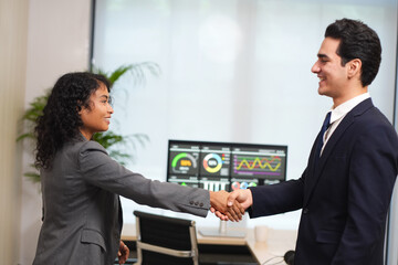 Business people, above or handshake in agreement forgreeting, meeting or partnership. Collaboration, thankyou or mature boss with man for B2B support, introduction or deal in office.