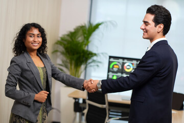 Business people, above or handshake in agreement forgreeting, meeting or partnership. Collaboration, thankyou or mature boss with man for B2B support, introduction or deal in office.