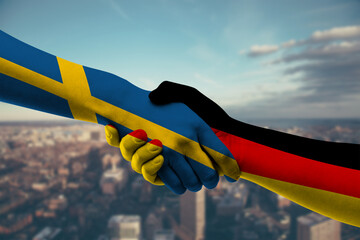 Shaking hands Sweden and Germany