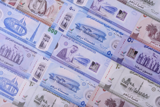 UAE money, dirhams, cash arabic banknotes for financial and business processes. Emirates cash