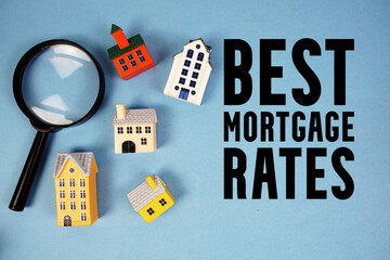 Best Mortgage Rates text with house models and magnifying glass on blue background