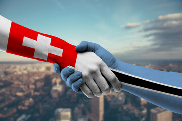 Shaking hands Switzerland and_Botswana