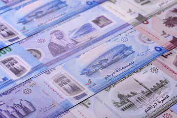 UAE money, dirhams, cash arabic banknotes for financial and business processes. Emirates cash