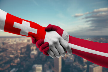 Shaking hands Switzerland and_Denmark