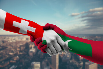 Shaking hands Switzerland and_Maldives