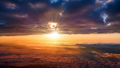 Obraz premium Bright Sun Shining Through Clouds At Sunrise Over Horizon