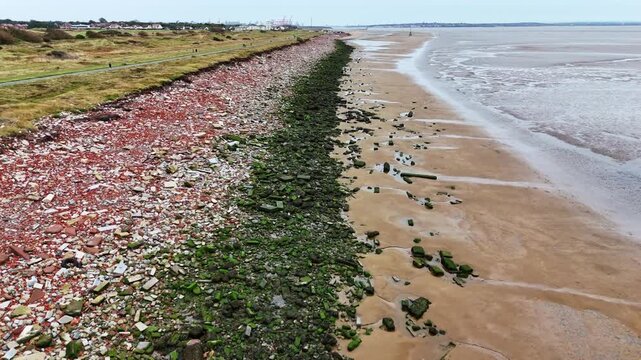 Aerial view of the Northern part of Crosby Beach near Liverpool featuring bricks and rubble from the remains of buildings in Liverpool bombed in the Blitz during WW2.