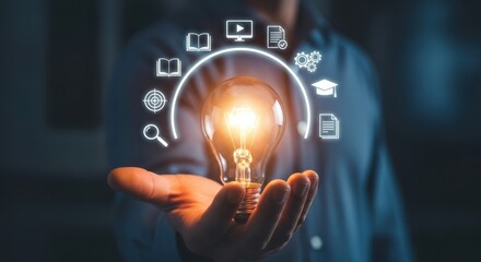 Person holding a glowing light bulb with educational icons in a semicircle above