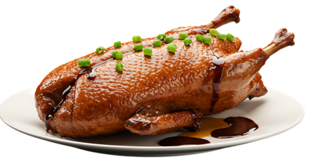 roasted duck served on plate garnished with greens on transparent background