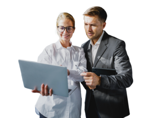 Businesswoman showing laptop to Businessman in office during the day