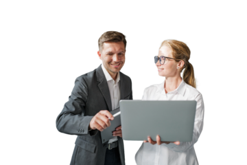 Man and woman collaborate using laptop and digital tablet in office