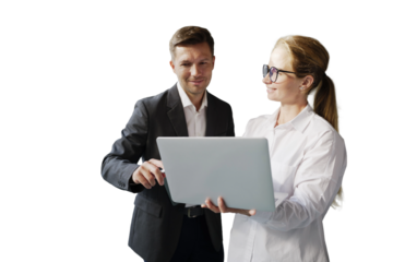 Man and woman collaborate using a laptop for business meeting