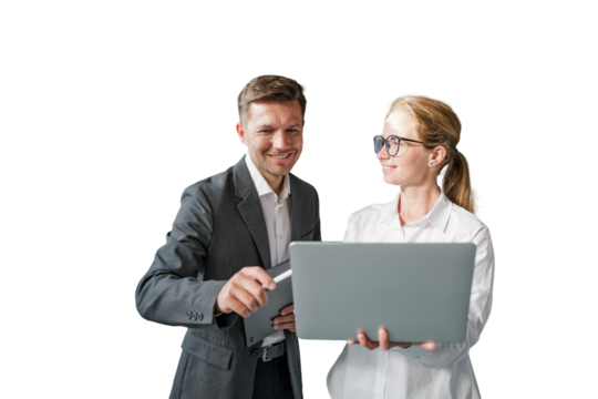 Man and woman collaborate using laptop and digital tablet in office