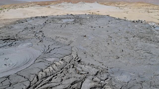 Closeup view of a bubbling mud volcano in Qobustan, Azerbaijan