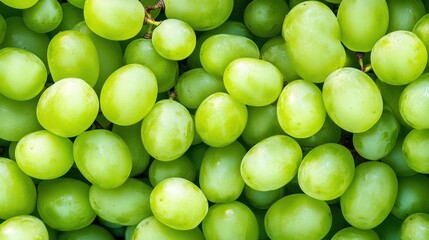 Fresh green grapes close up background texture