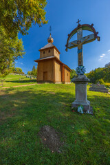 Wooden Church and Crucifix Standing in Cemetery in Smigovec, Slovakia