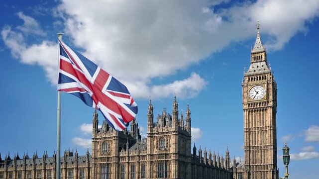 British Flag And Houses Of Parliament On Sunny Day