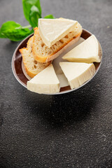 Processed cheese spread portion size cheese for sandwich tasty snack fresh delicious gourmet food background on the table rustic food top view copy space