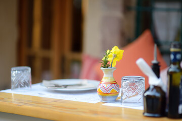 National restaurant tables on the street of the Old Bar Town in Montenegro