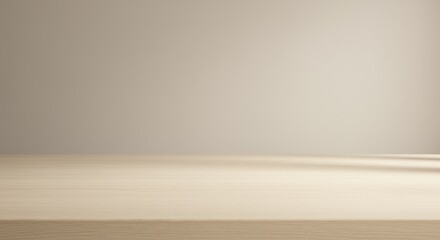 Neutral backdrop featuring a wooden table against a subtle wall