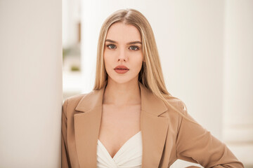 Naklejka premium Close up portrait of a beautiful young blonde girl