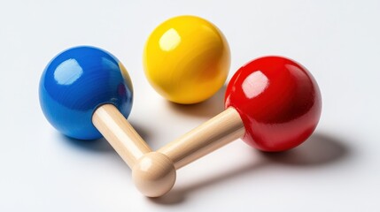 Wooden rattles on white background baby toy