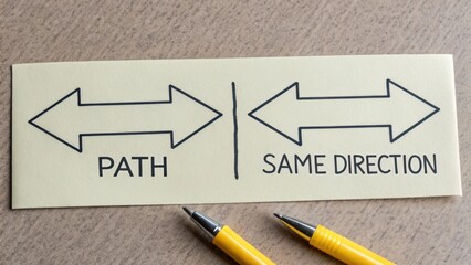 Directional Arrows on Sticky Note Indicating Path and Same Direction