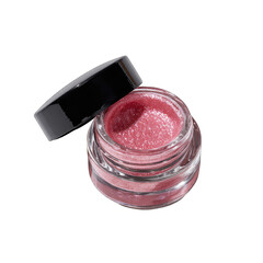 Open jar of pink eyeshadow with glitter