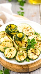 Grilled zucchini slices arranged on a plate