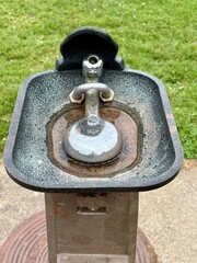 metal water fountain at a park