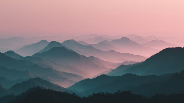 serene misty mountain layers under soft sunrise light creating peaceful atmospheric landscape view