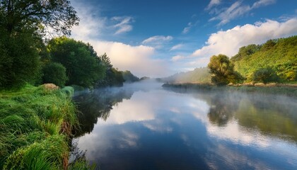 A Serene Misty River Landscape With Reflections And Soft Clouds
