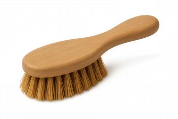 Natural cleaning brush with light wooden handle isolated on transparent background, perfect for scrubbing and household chores
