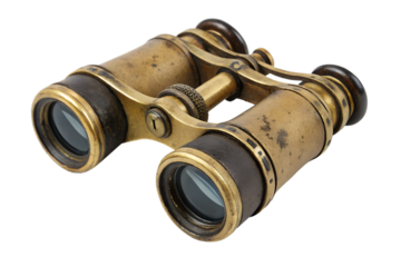 Close-up shot of antique brass binoculars with leather details, showcasing vintage design and craftsmanship