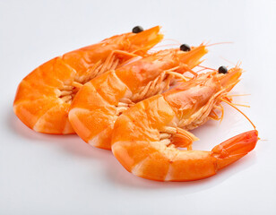 Three Cooked Shrimp on White Background, Close-Up View, Seafood Delights