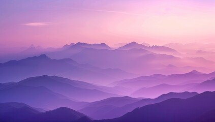 Obraz premium Serene vista of layered mountains at dawn, bathed in a soft, purplish-pink hue, with mist clinging to the valleys