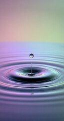 A single water droplet impacts a calm surface, creating concentric ripples that radiate outwards.  The background is a soft, pastel gradient