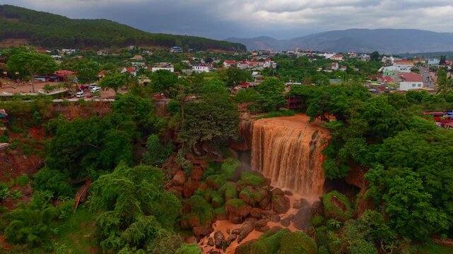 Aerial view Thac Voi Elephant waterfall in forest near Da Lat city and Linh An pagoda in Vietnam..