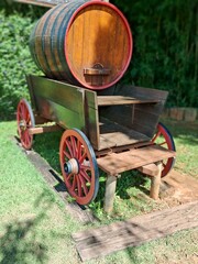 Wheelbarrow with wooden barrel