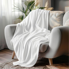 Cozy up with this soft throw blanket draped over a modern armchair in a stylish living room space