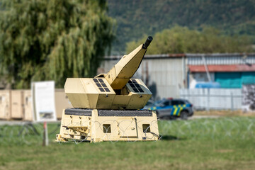 Automated defense system against drones and other hostile small flying objects