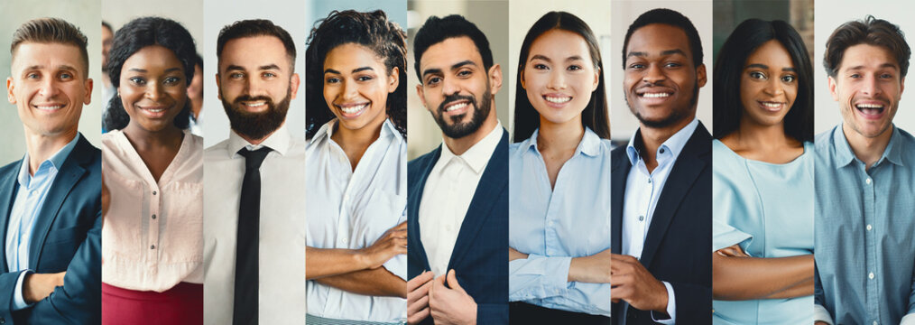 A group of business professionals consisting of men and women from diverse backgrounds stands together in a modern office.