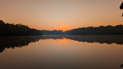 Obraz premium sunset on the river