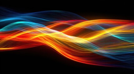 abstract flowing neon light trails in vibrant red blue and yellow against a dark background creating a dynamic energy wave pattern