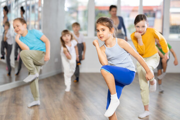Fototapeta premium Group of children boys and girls dance hip hop in studio
