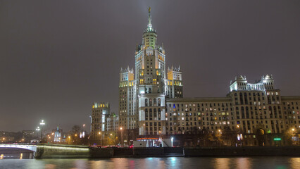 Obraz premium Night view of the Kotelnicheskaya Embankment Building hyperlapse in Moscow timelapse, Russia.