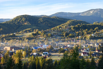 View of the village of Kosmach at dawning. Kosmach is a village located in the Carpathian Mountains, in Kosiv region, Ivano-Frankivsk Oblast, Ukraine. Autumn morning landscape.