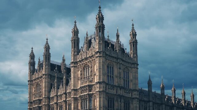Houses Of Parliament In Sunlight With Clouds Above
