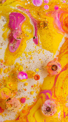 Colorful abstract liquid art background with pink yellow orange bubbles, vibrant psychedelic fluid paint texture, bright modern creative design