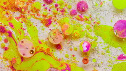 Colorful abstract liquid art background with pink yellow orange bubbles, vibrant psychedelic fluid paint texture, bright modern creative design